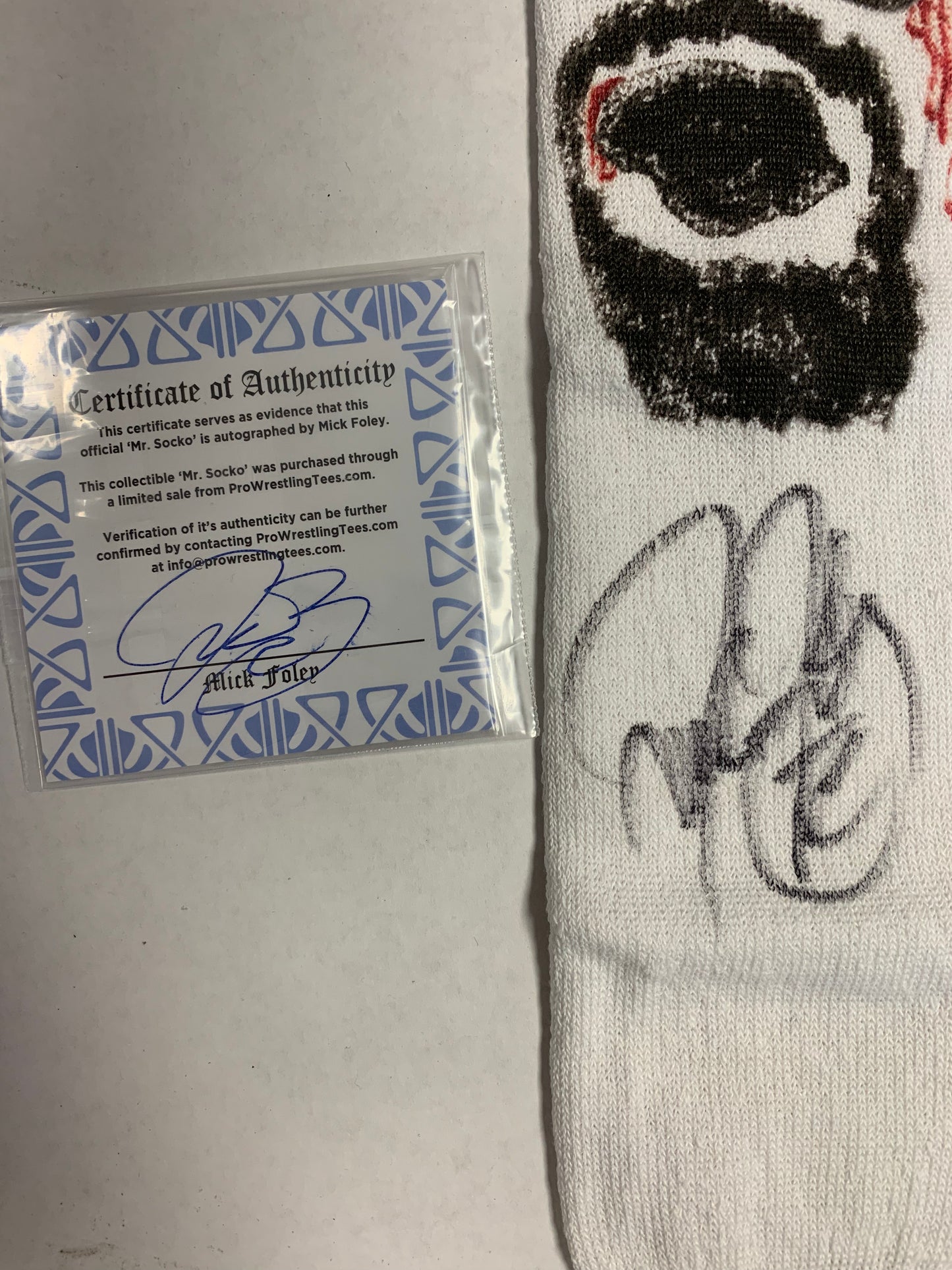 Mick Foley autographed Mr. Socko